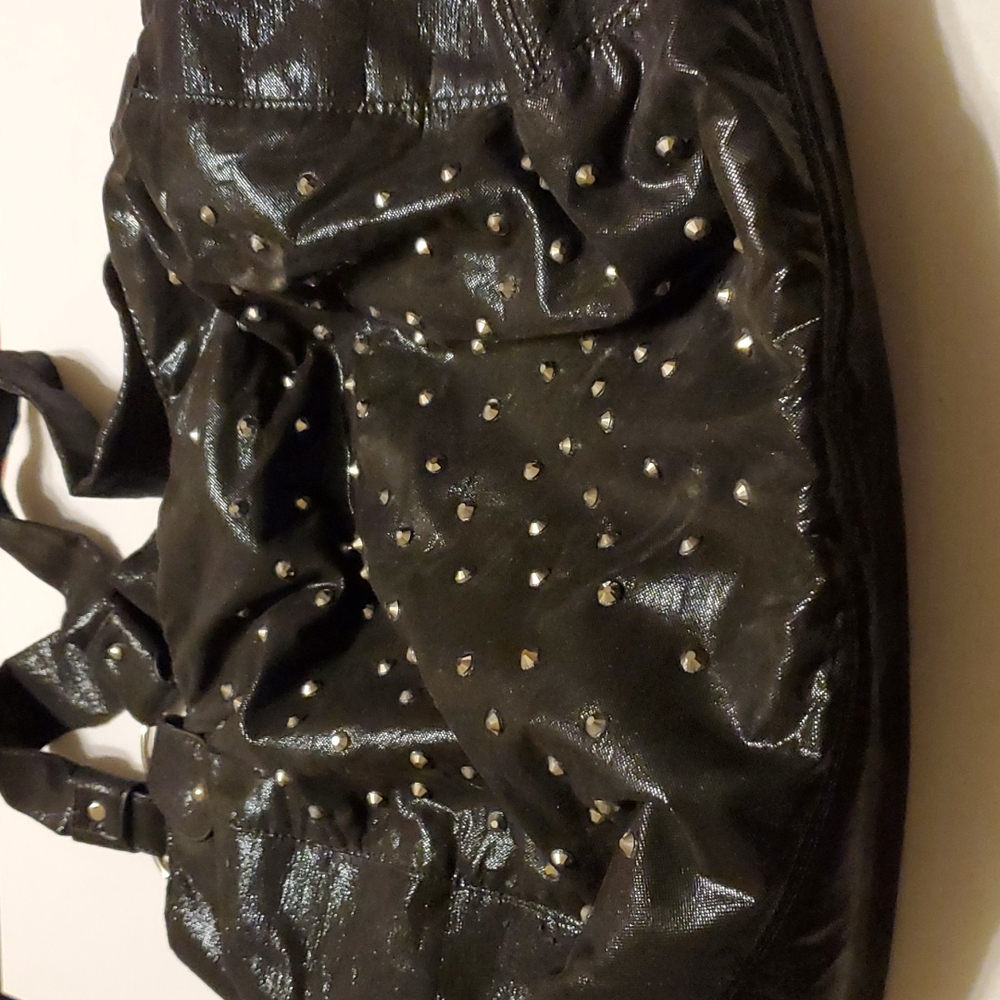 Joan Boyce designed hobo purse, Black shiny fabric,lined,lots of pockets inside